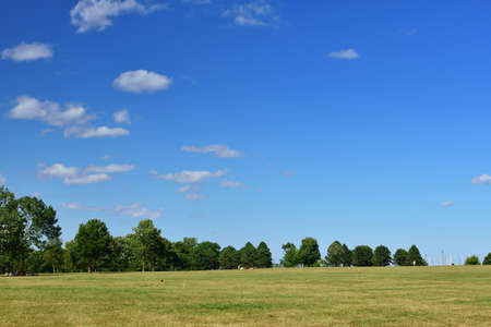 The blue sky and grasslandの写真素材