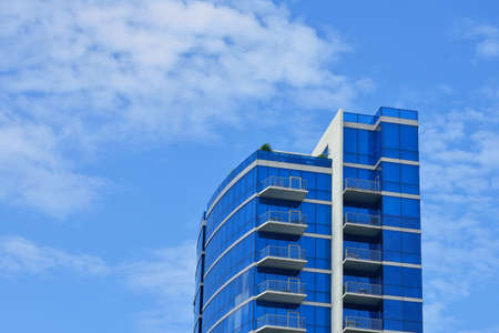 Sky blue glass curtain wall buildingのeditorial素材