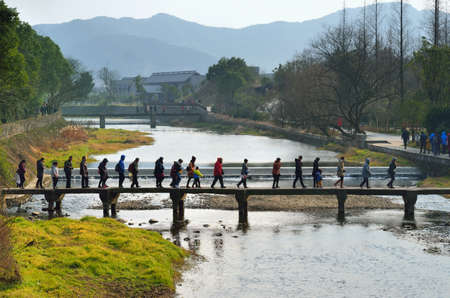 Tourists on the stone bridge