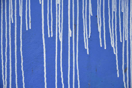 White lines on the blue wallの写真素材