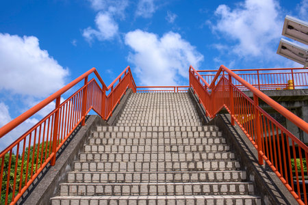Staircase to the top of the mountain with blue sky.の写真素材