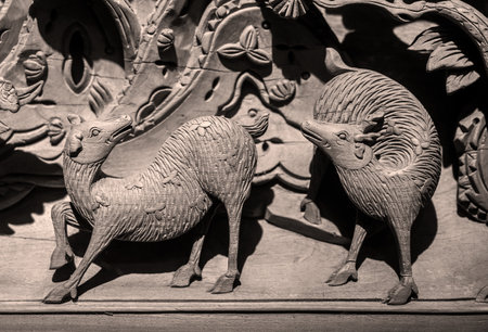 Wooden figures of sheep, close-up. Black and white.のeditorial素材