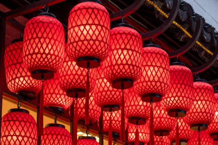 Red Chinese lanterns in a Chinese temple, closeup of photo