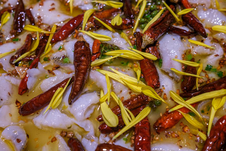 Close up of Thai style dumpling with chilli topping.の写真素材