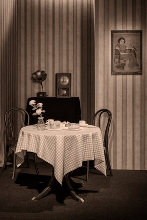 Vintage interior of a room with a table, chair and clock