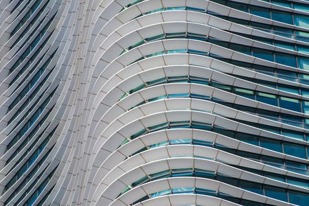 Detail of the facade of a modern office building in Singapore.