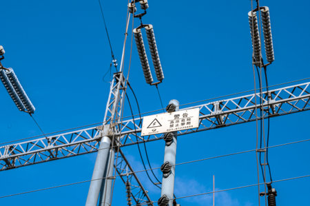 High voltage post with blue sky background,High voltage post with blue sky background.の写真素材