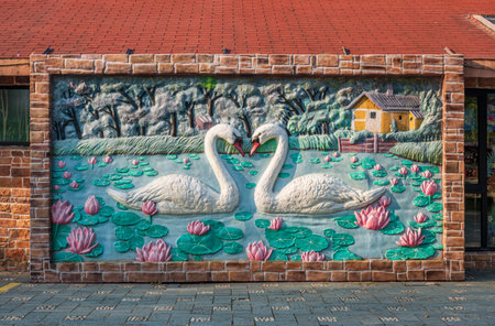 Swan graffiti on the wall of a building in the center of Vilnius, Lithuania