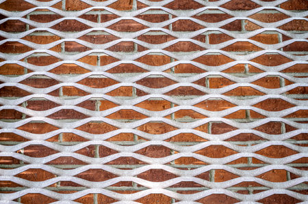 Background of brick wall texture pattern with white and red netting.の写真素材