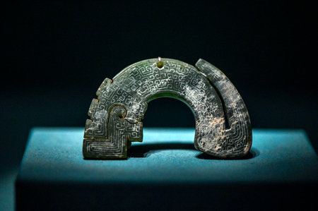 Ancient metal earrings, close-up, on a black backgroundの写真素材