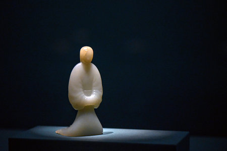 Chinese porcelain Buddha in a museum, closeup of photoの写真素材