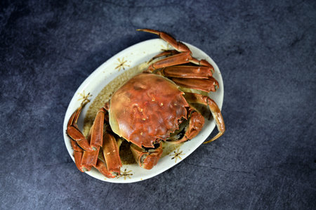 Boiled crab in a plate on a dark background. Seafoodの写真素材