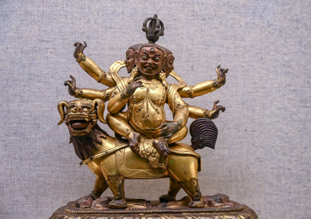 Bronze statue of a chinese god, closeup of photo