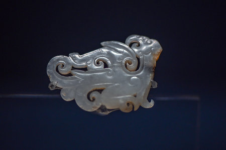 Chinese ancient metal carving works, closeup of photo on black backgroundの写真素材