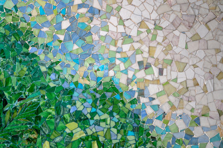 Colorful mosaic tiles on the wall of the house. Abstract background.の写真素材