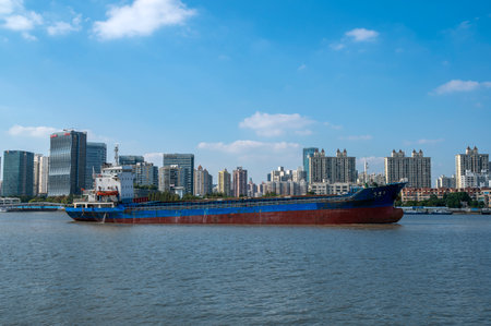 Large cargo ship in the Chao Phraya River, Bangkok, Thailandの写真素材