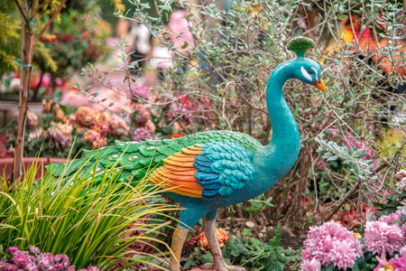 Colorful peacock statue in the garden, Thailand. (Selective focus)の写真素材
