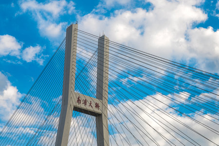 Suspension bridge in Chongqing against the blue sky.の写真素材