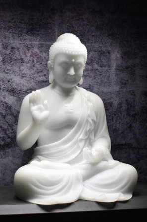 White buddha statue in the temple, closeup of photoのeditorial素材