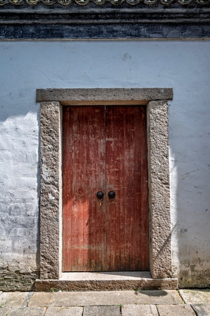 Old wooden door in the old town of Guizhou, China.の写真素材