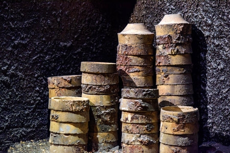 Industrial background of old rusty metal pipes in an abandoned factory.の写真素材