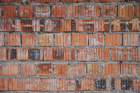 Old red brick wall background texture close up. Brickwork texture.