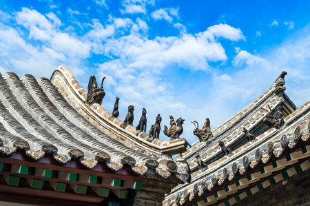 Roof of ancient Chinese temple with blue sky in Beijing, Chinaの写真素材