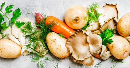 Food background, vegetables, ingredients for vegetarian mushroom soup, top view, flat layの写真素材