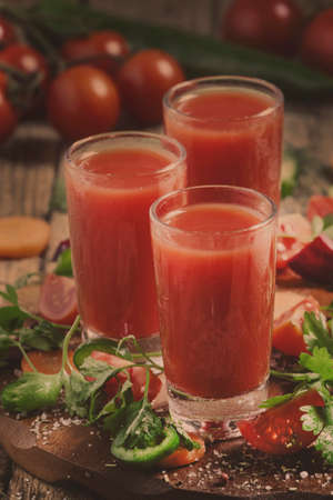 Diet vegetable and tomato juice, fresh food and drinks, selective focusの写真素材