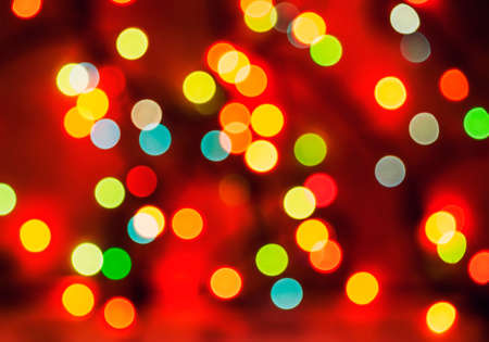 Multicolored defocused bokeh blurry lights, Christmas lights, festive background