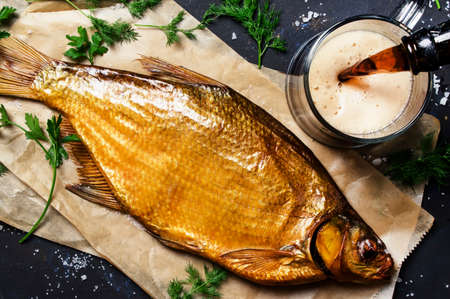 Frothy beer with smoked bream, top viewの写真素材