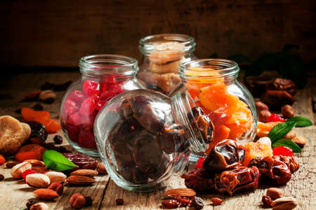 Dried dates in a glass jar, selective focusの写真素材