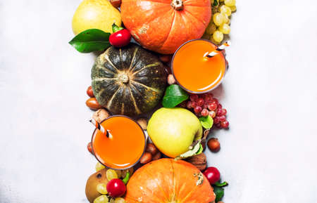 Pumpkin juice, autumn harvest of fruits and vegetables, thanksgiving concept, top viewの写真素材