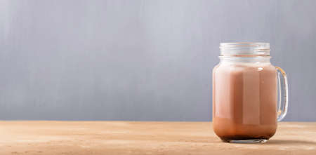 Winter hot non-dairy vegan chocolate in glass jar, copy spaceの写真素材