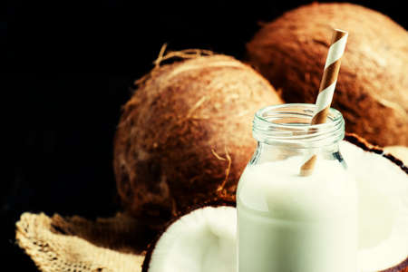 Coconut milk, rustic style, selective focus