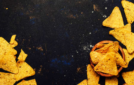 Nachos In Wooden Bowl, Black Background, Top Viewの写真素材