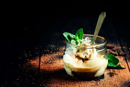 Dessert from coffee and ice cream with mint, selective focusの写真素材