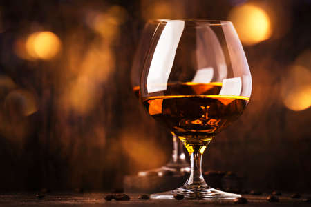 Armagnac, French grape brandy, strong alcoholic drink. Still life in vintage style, selective focus