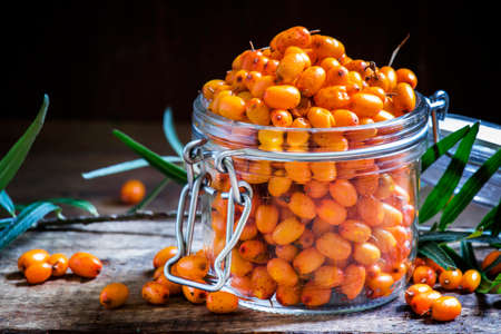 Fresh buckthorn, rural style, selective focus