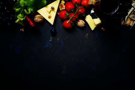 Red wine and snacks, Italian food, top viewの写真素材