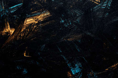 Abstract black, blue and gold backgroundの写真素材