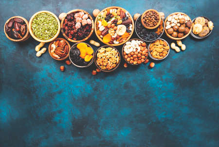 Nuts and dried fruits. Dried apricots, figs, prunes, raisins, cranberries, pecans, walnuts,...