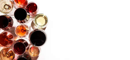 Red, rose and white wine in glasses on white background, top view. Wine bar, shop, winery, wine...
