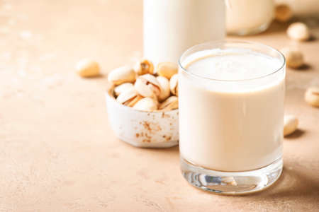 Cashew milk in bottles. Non dairy alternative vegan drink. Negative spaceの写真素材