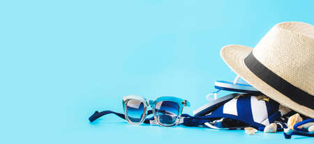 Set of blue white summer beach things in nautical style for vacation on blue long banner background, space for textの写真素材