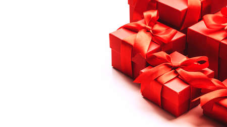 White background with gift boxes, ribbons, bows. Preparation for holidays. Christmas, Valentines...