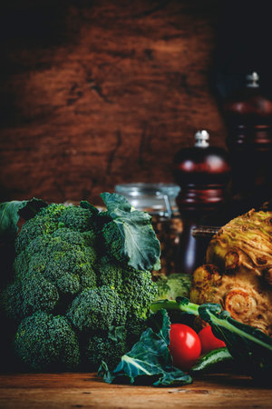 Food background with farm vegetables: cauliflower, broccoli, root celery, pumpkin, tomatoes, herbs...