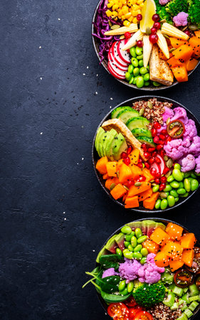 Vegan buddha bowls assortment with pumpkin, quinoa, tomatoes, spinach, avocado, radish, soybeans...