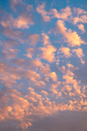 Sky clouds sunset nature background. Stunning view of golden clouds and gradient blue sky