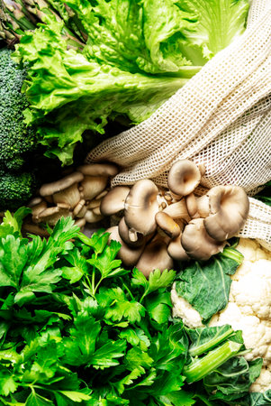 Fresh Food Background. Reusable Eco Fabric Bags for Storage with Green Vegetables, Cabbage Broccoli,...